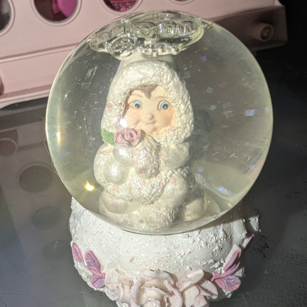 Charming Snow Globe with Pink Accents